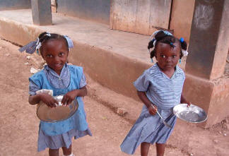 two girls returning plates